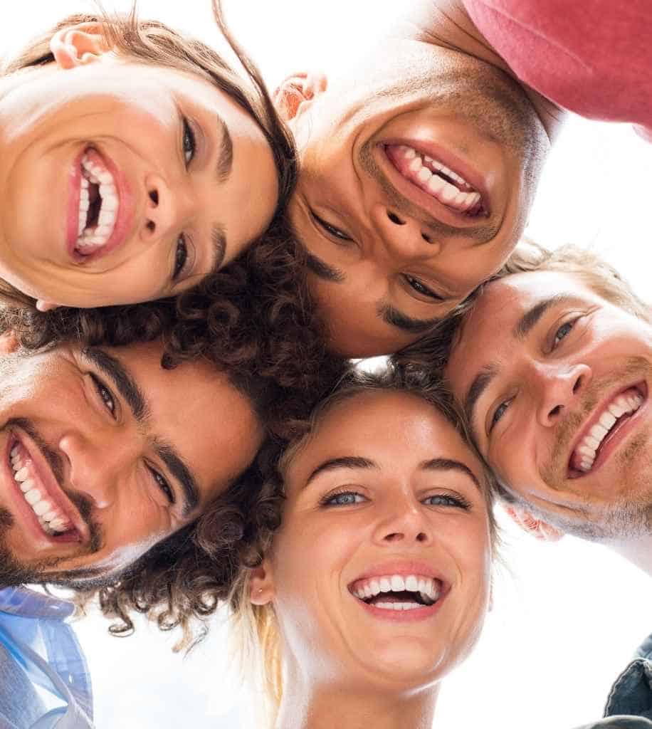 Smiling person showcasing white teeth after laser whitening treatment Crawley